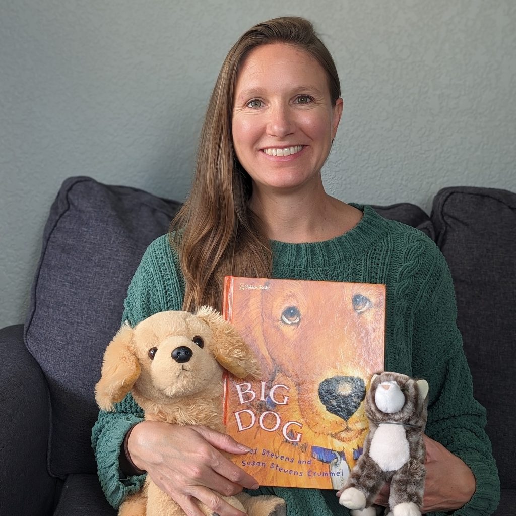Teacher holding the book My Big Dog