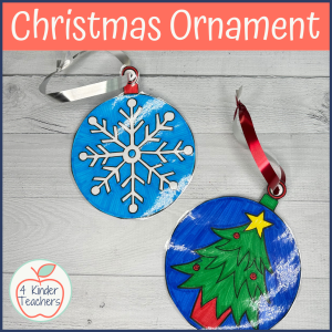 round christmas ornaments made from construction paper, with a snowflake on one and a christmas tree on the other