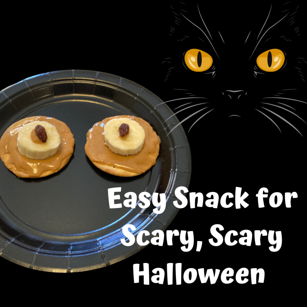 This easy cracker snack for Scary, Scary Halloween looks like eyes with cat eyes in the background.